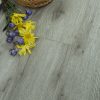 Fruits and flowers on wooden floor.